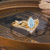 Nature-Inspired Pear-Cut Aquamarine Couple's Engagement Ring Set